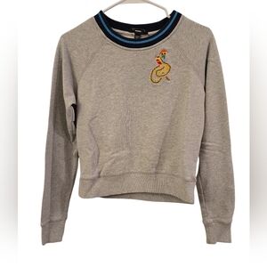 DIESEL DOUBLE SIDED SNAKE AND GRAPHIC PRINT ON THE BACK. SIZE SMALL. RUNS SMALL.